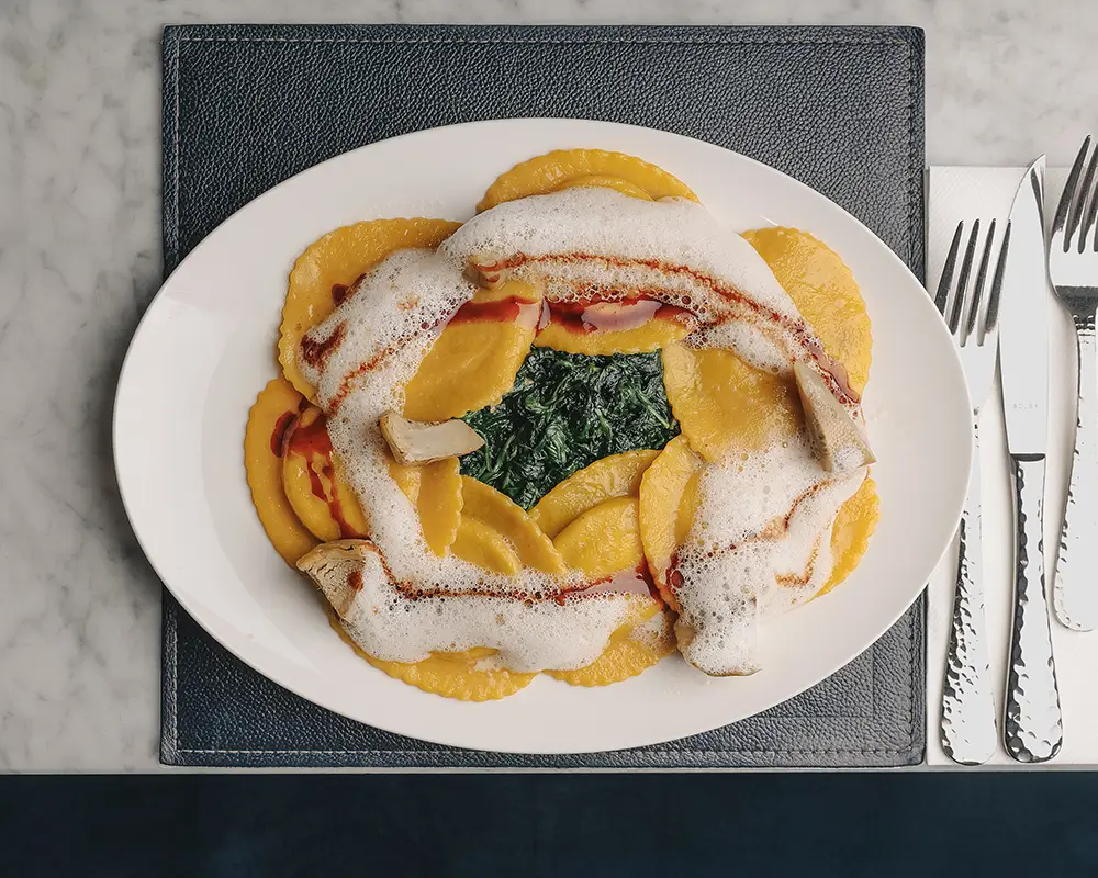 Ravioli<br />
mit Ochsenschwanz Füllung